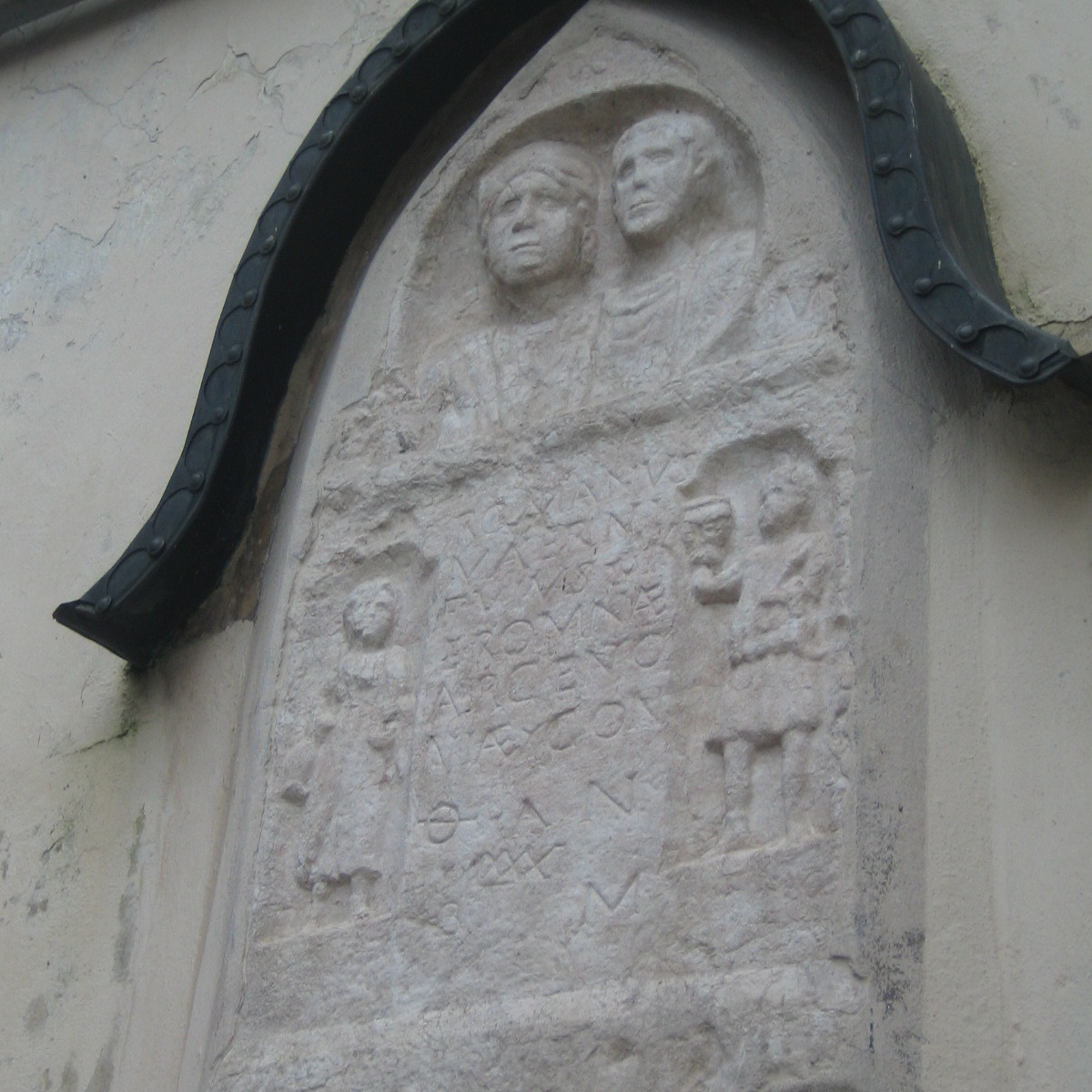 Roman stone on the church tower
